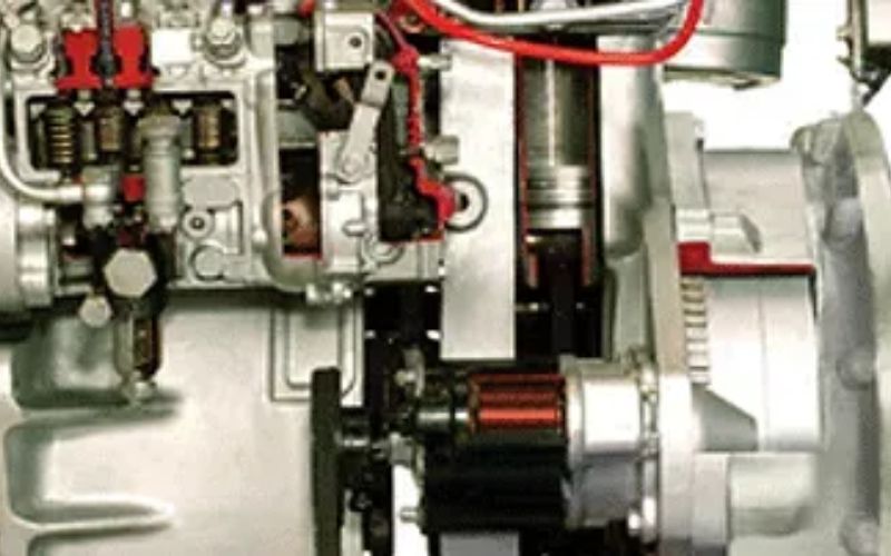 Close-up view of Mahindra 265 DI XP PLUS tractor engine showcasing internal components and mechanical details.